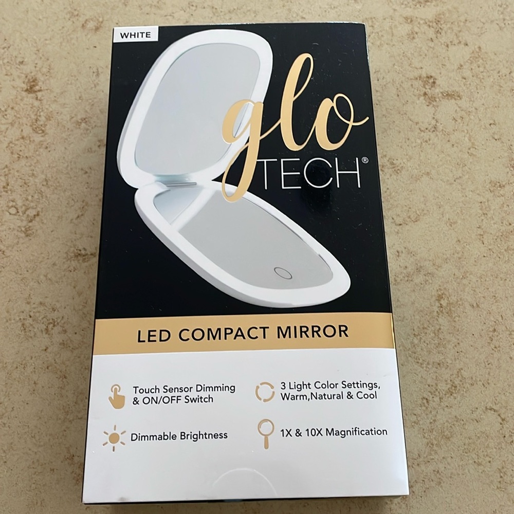 GloTECH compact led mirror. Brand new, never opened.
